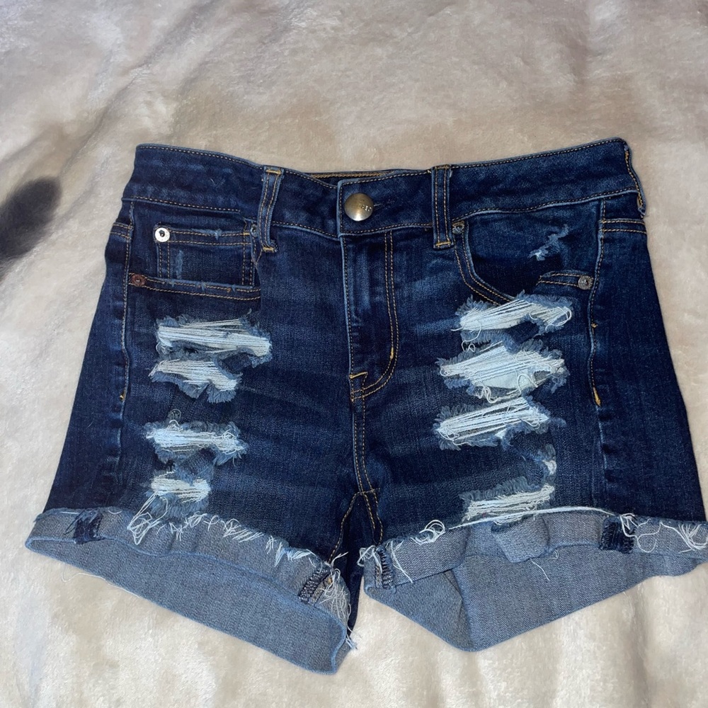 Brand~ American Eagle jean shorts, Color~ Dark Blue w/rips, Size~ US:4 & UK: 8